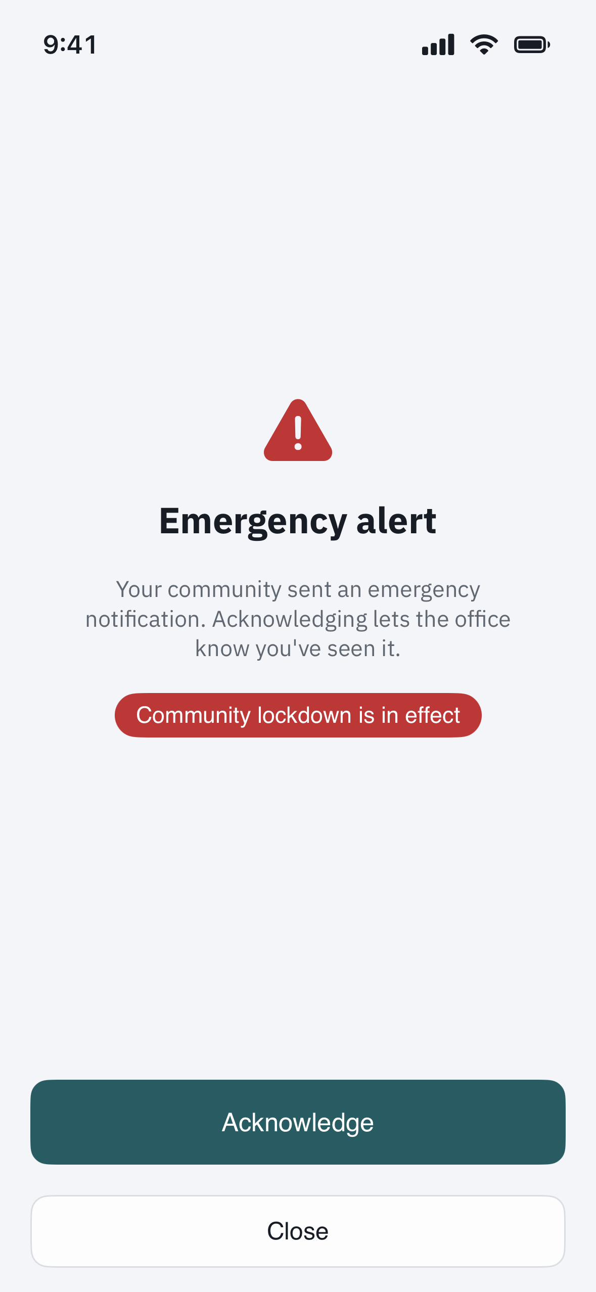 an emergency alert banner as a resident sees it, with an Acknowledge button